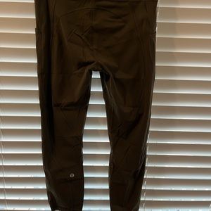 Lulu lemon capri leggings. Dark olive color. Size 8.